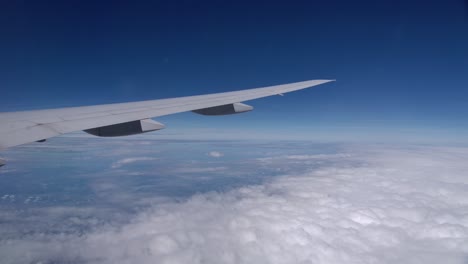 Slick-Boeing-B787-Airplane-Wing-in-High-Altitude-Cruise-Flight
