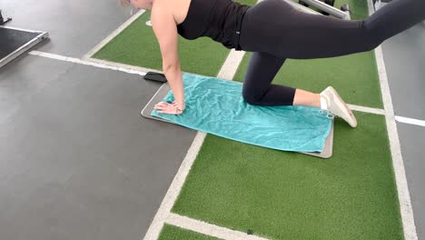 Slow-Motion-Gym-Workout-of-Woman-doing-Bird-Dog-exercise