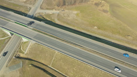 Top-down-view-of-a-highway-overpass-and-interchange