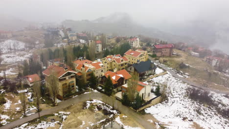 Flying-over-the-village-of-Kfardebian-on-a-cloudy-and-cold-morning