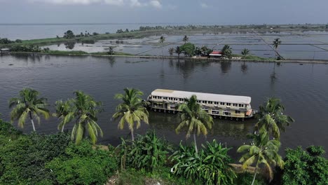 Aerial-drone-view-moving-forward-in-the-middle-of-the-water-where-a-lot-of-water-is-visible-Cruise-full-of-people