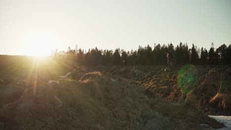 Man-With-His-Dog-Walking-In-The-Field-In-The-Early-Morning