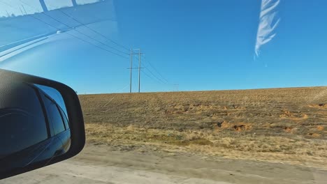 Imágenes-De-La-Cámara-Del-Tablero-Conduciendo-Por-La-Ciudad-Ovalada-Azul-De-Ford,-Mostrando-Sus-Enormes-Instalaciones-De-Producción-De-Baterías-Y-Vehículos-Eléctricos