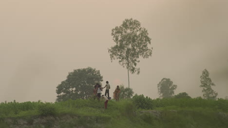 group-of-village-children-playing-together-during-sunset-time