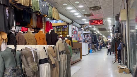 Market-bazaar-in-Erbil,-Iraq-KRG-selling-traditional-Kurdish-suits