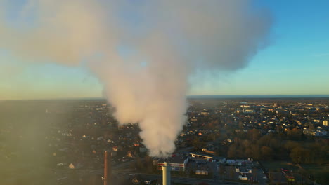 Smoke-Emission-From-Industrial-Factory-Chimney-At-Sunrise