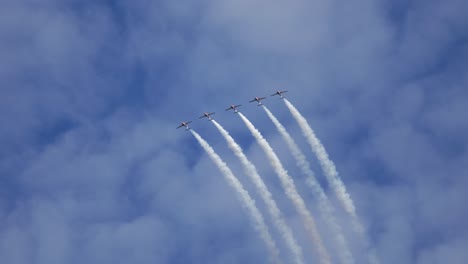 Canadian-Snowbirds-Formation-Team-Flying-a-Looping-at-Airshow-TRACK
