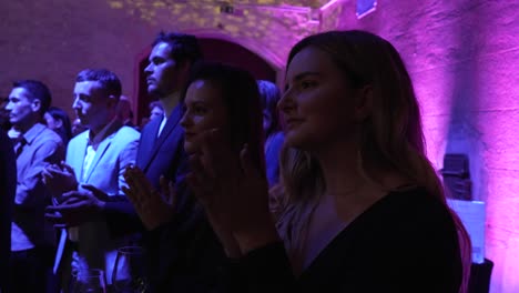 Audience-applauding-at-an-elegant-gala-event