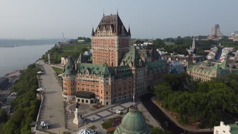 drone-approaching-Château-Frontenac-most-famous-landmark-Quebec-City-old-town-Canada-historical-old-buildings-aerial-footage