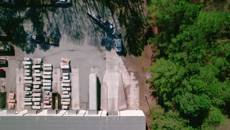 Semi-truck-driver-with-flatbed-load-waiting-for-dispatch-to-call-him-for-unloading-his-trailer