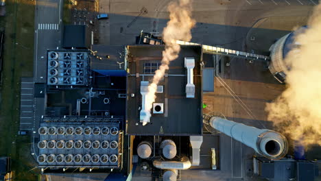 aerial-top-down-of-old-coal-power-plant-station-with-white-smoke-co2-chimney-releasing-in-to-the-atmosphere-zero-emission-air-pollution-concept