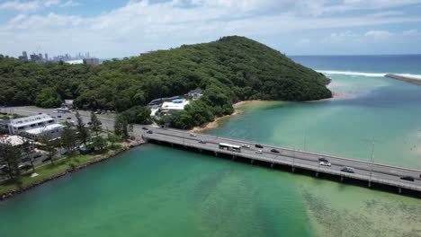 Aerial-View-Of-Cars-Driving-On-Gold-Coast-Highway-At-Tallebudgera-Creek-Bridge-In-Queensland,-Australia