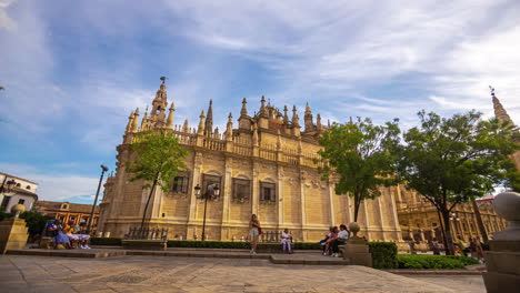 Large-Gothic-cathedral-Moorish-bell-tower-city-views-Seville-time-lapse-Spain