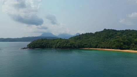 Aerial-tracking-shot-in-front-of-praia-grande-in-Prince-Island,São-Tomé,Africa