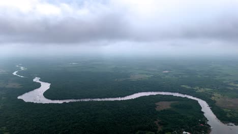 Aerial-shot-of-a-river-in-Veracruz-jungle-in-Mexico