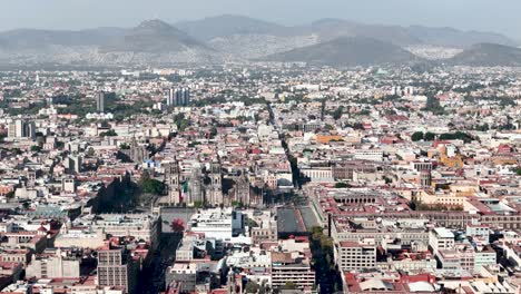 Drone-shot-of-downtown-mexico-city-and-national-palace