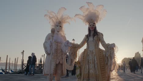 Venetian-Carnival-Duo-in-Golden-Sunrise