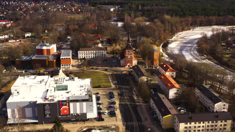 City-center-of-small-town-Valmiera-in-aerial-dolly-out-view-on-sunny-spring-day