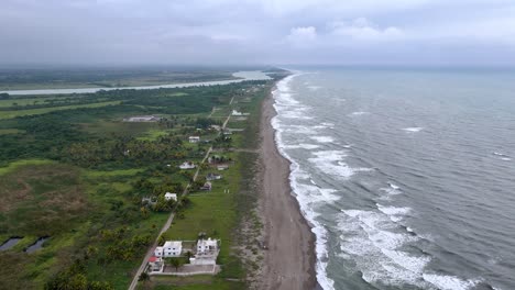 Drone-shot-of-coast-line-of-veracruz-in-mexico-with-constructions