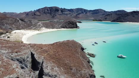 Aerial-view-of-Bahia-Puerto-Balandra-with-clear-turquoise-waters-of-Gulf-of-California-and-tropical-beaches---landscape-panorama-of-Latin-America-from-above