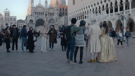 Tourists-Snap-Photos-with-Carnival-Duo-in-Venetian-Square
