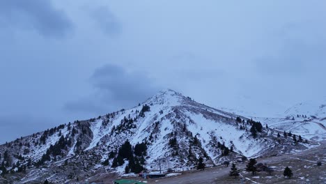 Drone-shot-of-snow-mountain-peak-landscape-in-Helmos-mountain-Greece-|-4K