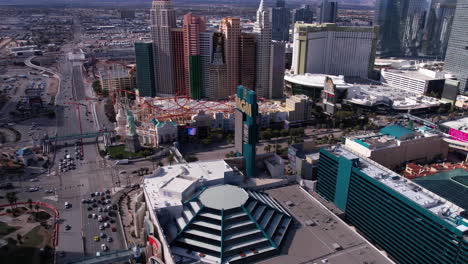 Las-Vegas-NV-USA,-Aerial-View-of-MGM-Grand-and-New-York-New-York-Hotel-Casino-Resorts,-Traffic-on-Strip-Boulevard-and-Tropicana-Avenue-Intersection