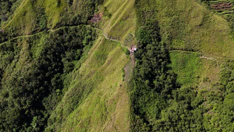 Drone-footage-of-a-path-on-the-side-of-a-mountain-in-Luzon,-north-Philippines