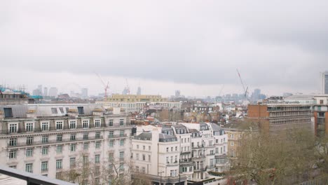 London-skyline-from-Park-Lane,-showcasing-iconic-landmarks-and-urban-landscape-against-the-sky