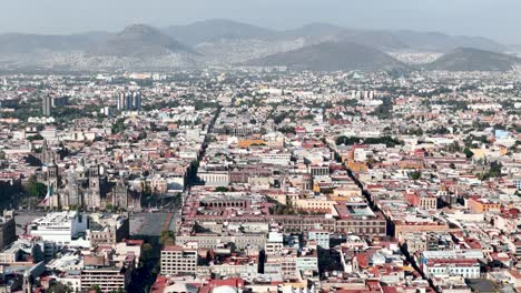 Drone-shot-of-downtown-mexico-city-and-national-palace-in-December