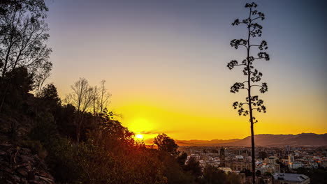 Sunrise-timelapse-over-Malaga,-view-from-mountains