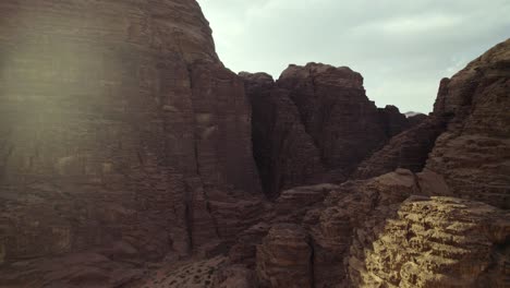 Beautiful-Rocky-Desert-Canyon-Cliffs-in-Wadi-Rum,-Jordan-in-the-Middle-East,-Aerial