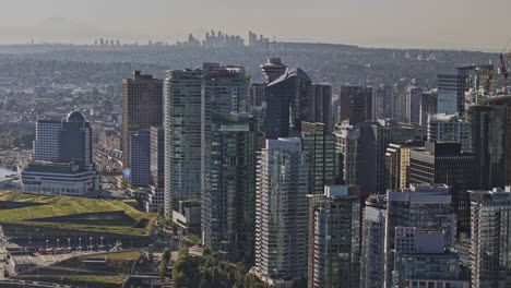 Vancouver-BC-Canada-Aerial-v84-zoomed-shot-drone-elevation-flyover-capturing-downtown-cityscape-with-towering-skyscrapers-and-Eastside-Burnaby-views---Shot-with-Mavic-3-Pro-Cine---July-2023