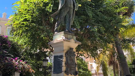 Monument-to-Emilio-Castelar-in-Cádiz,-Spain,-Statue-in-Park-on-Hot-Sunny-Day
