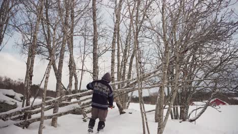 Man-Cutting-Tree-Branches-With-Loppers-Scissors