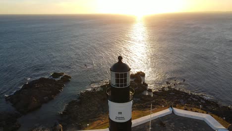 Aerial-view-of-lighthouse-sunset-in-Salvador-,-Bahia,-Brazil