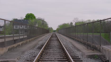 Moving-forward-Establishing-shot-of-train-tracks-with-leading-lines