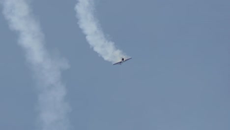 Stunt-plane-in-a-stalled-spiral-with-smoke-trail