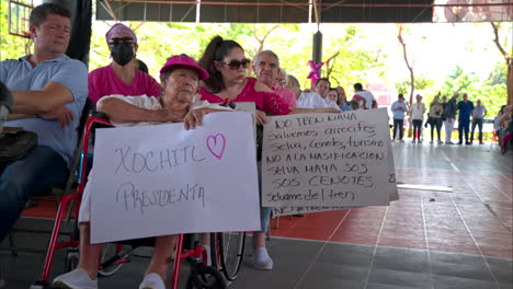 Supporters-of-the-Mexican-female-presidential-candidate-Xochitl-Galvez-gathering-at-a-rally-carrying-signs