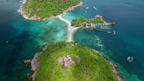 Tilt-up-reveal-shot-of-Koh-Nang-Yuan-Island,-Koh-Tao-in-Thailand