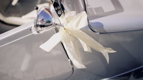 Classic-car-adorned-with-decorative-ribbon