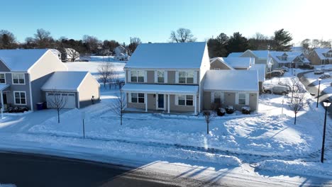 Approaching-flight-of-beautiful-snow-capped-home-in-American-Small-Population