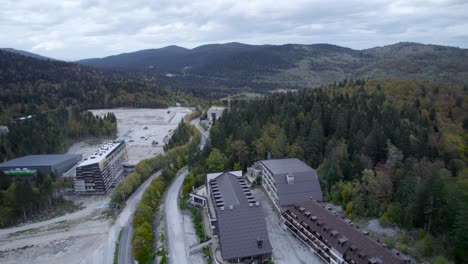 Aerial-of-deforestation-area-in-Bosnia,-trees-are-cut-for-hotels