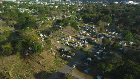 Drone-rotating-over-tombstones-and-graves-in-the-Manila-memorial-park,-Philippines