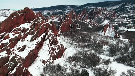 Fresh-snow-sunny-bluesky-Roxborogh-State-Park-Golf-Course-aerial-drone-Colorado-Front-Range-winter-spring-deep-powder-dramatic-sharp-pointy-red-rocks-mountain-landscape-Littleton-Denver-forward-reveal