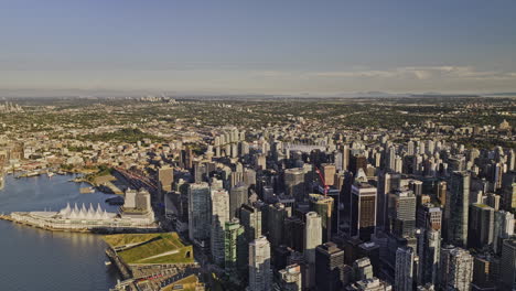 Vancouver-BC-Canada-Aerial-v53-drone-flyover-the-harbour-capturing-waterfront-downtown-cityscape,-Gastown-and-Eastside-views-from-above-on-a-sunny-day---Shot-with-Mavic-3-Pro-Cine---July-2023