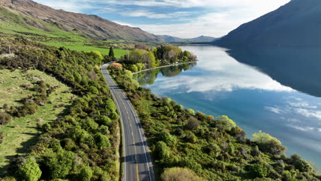 Lake-Wakatipu-road-towards-Kingston-from-Queenstown,-New-Zealand-South-Island