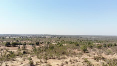 Aerial-shot-of-barren-arid-land-in-summer-in-Charu-village-in-Chatra,-Jharkhand,-India