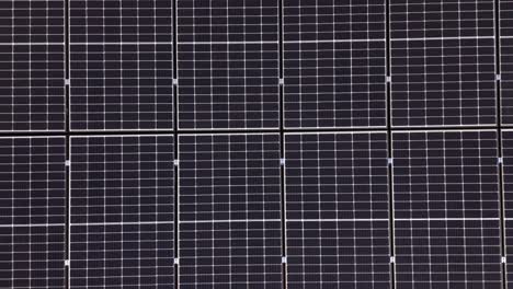 Top-View-Of-Photovoltaic-Cell-System-On-The-House-Roof---Drone-Shot