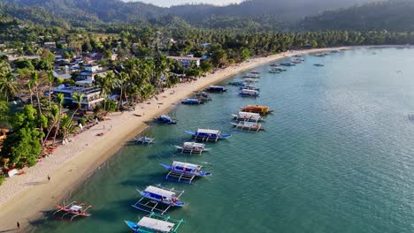 Distant-drone-footage-of-Port-Barton's-beach-on-Palwan-island-in-the-Philippines